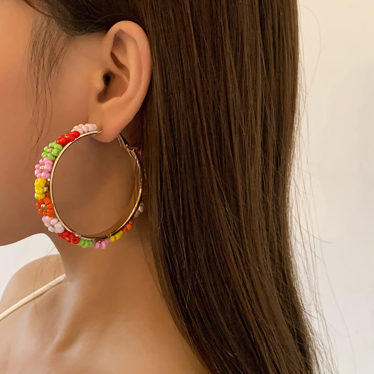 Boucles d'oreilles style bohème en forme de petite marguerite