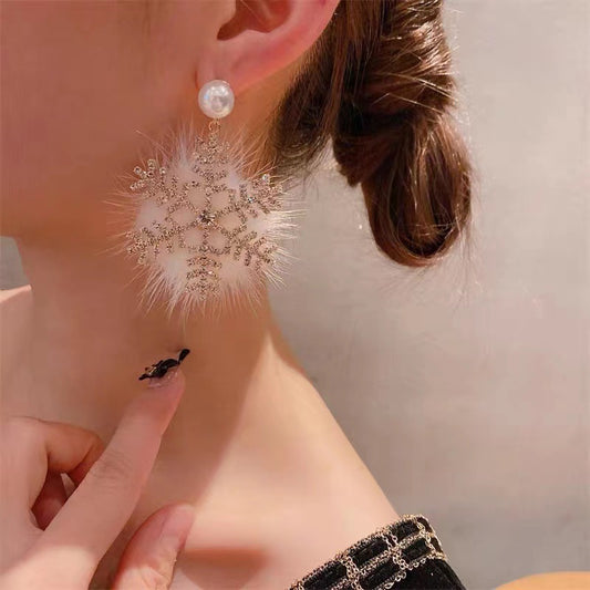 Boucles d'oreilles flocon de neige exagérées en perles de zircon de Noël