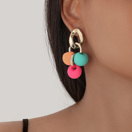 Boucles d'oreilles exagérées en forme de boule de bonbon colorée